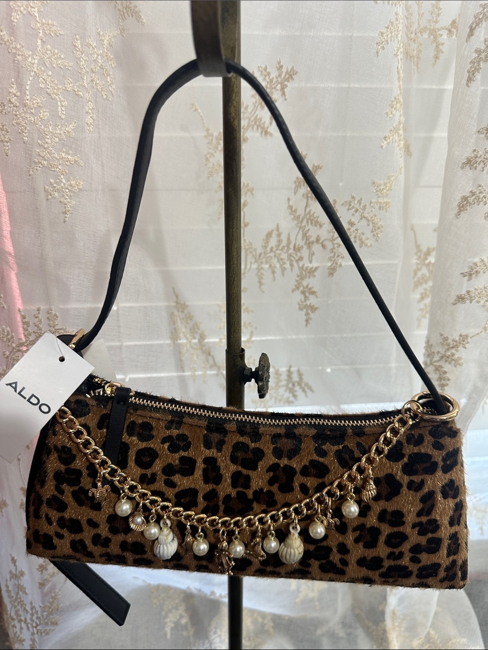 Aldo cheetah print faux fur shoulder bag with ocean themed bag charm